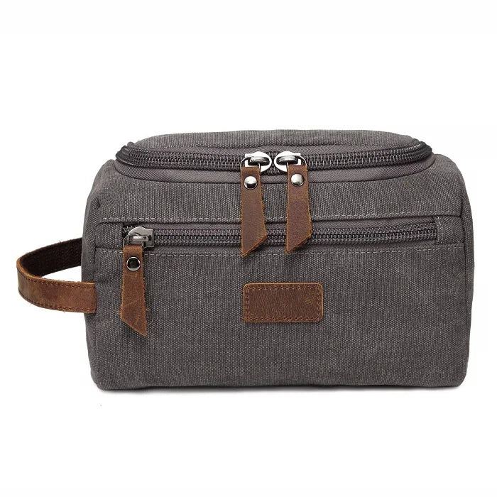Une trousse de toilette homme couleur gris