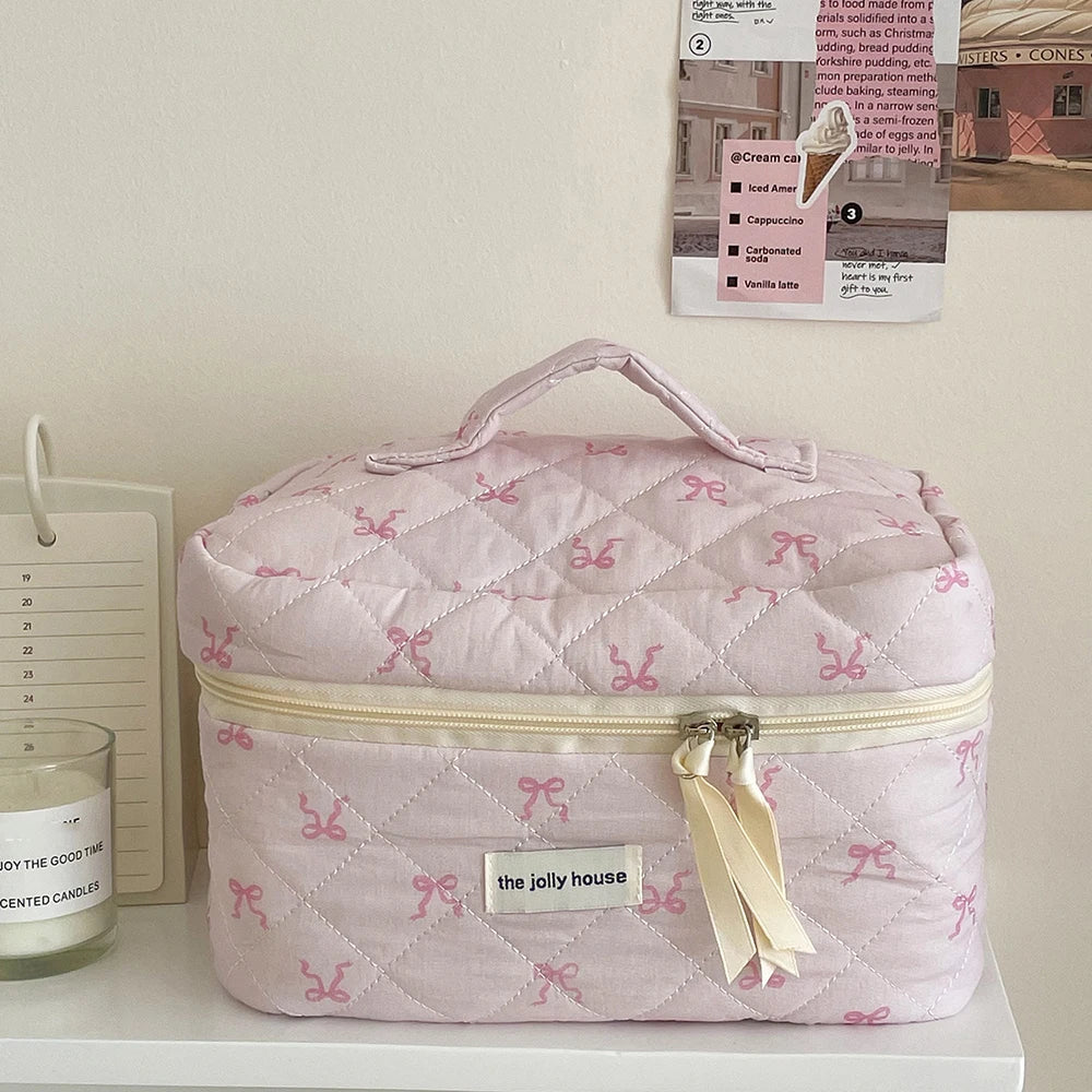 trousse de toilette matelassée rose