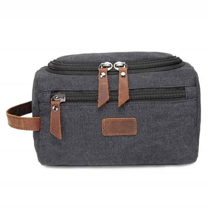 Une trousse de toilette homme couleur noir