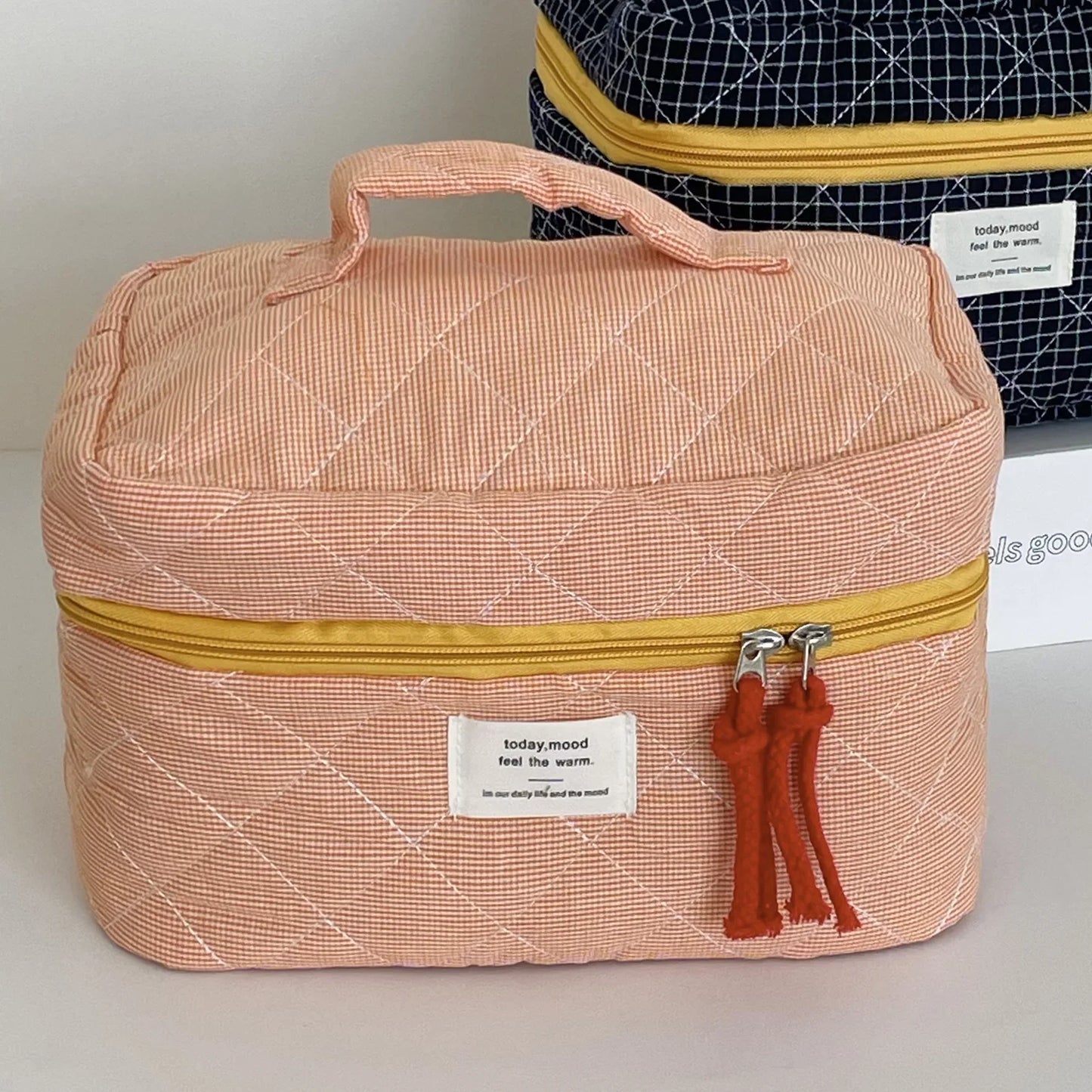 trousse de toilette matelassée orange