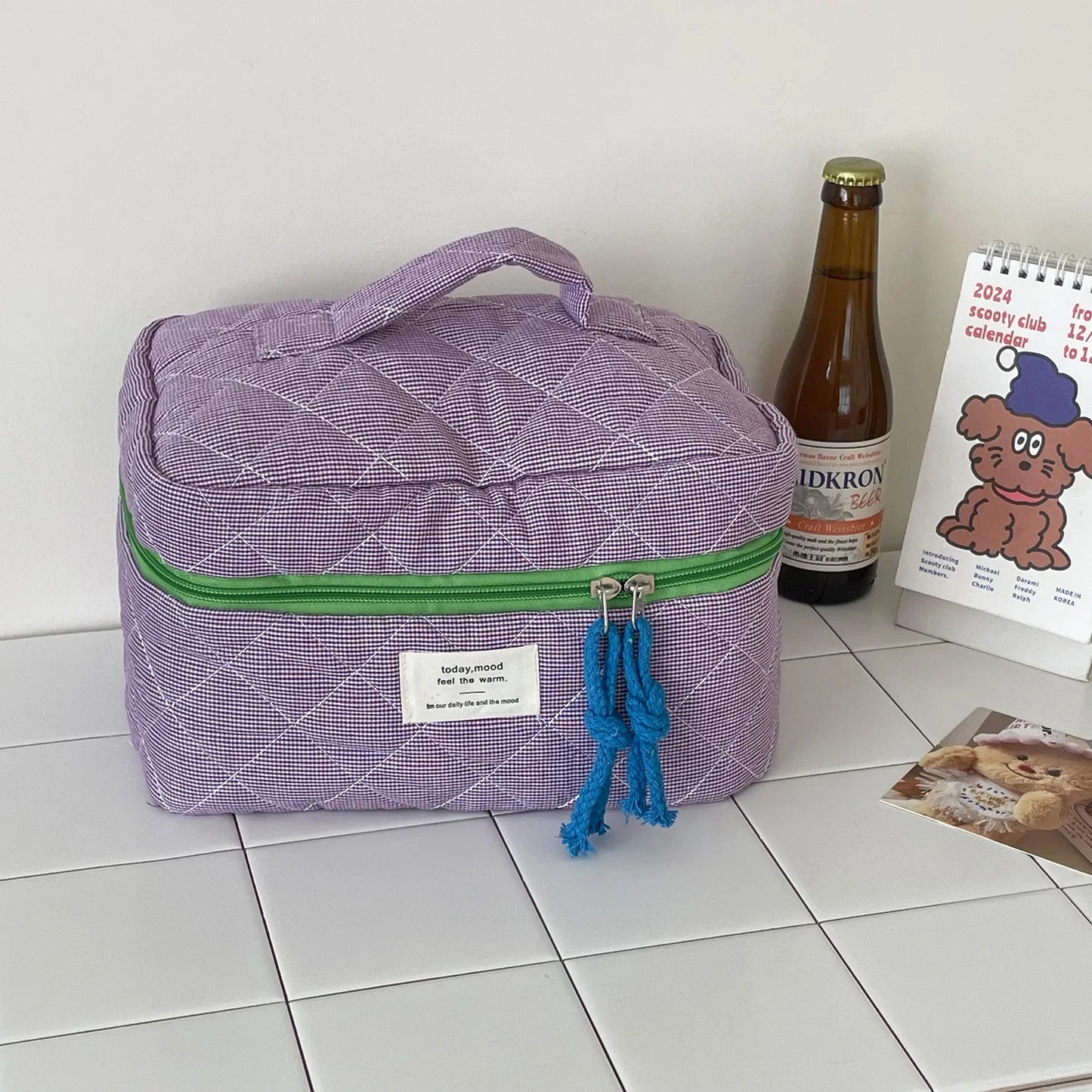 trousse de toilette matelassée violet