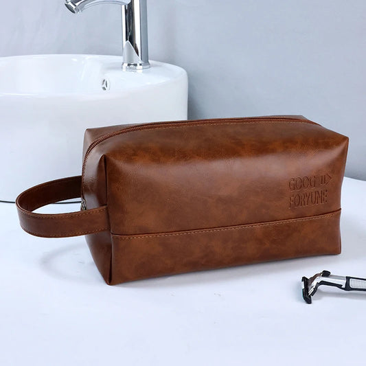 une trousse de toilette homem cuir marron
