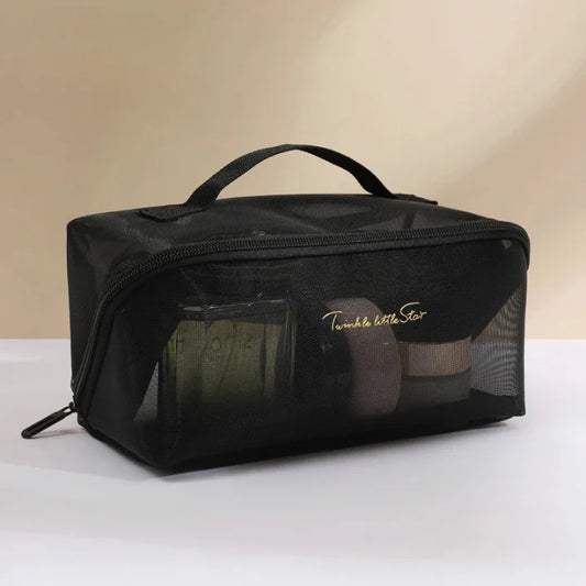 une trousse de toilette transparente noir